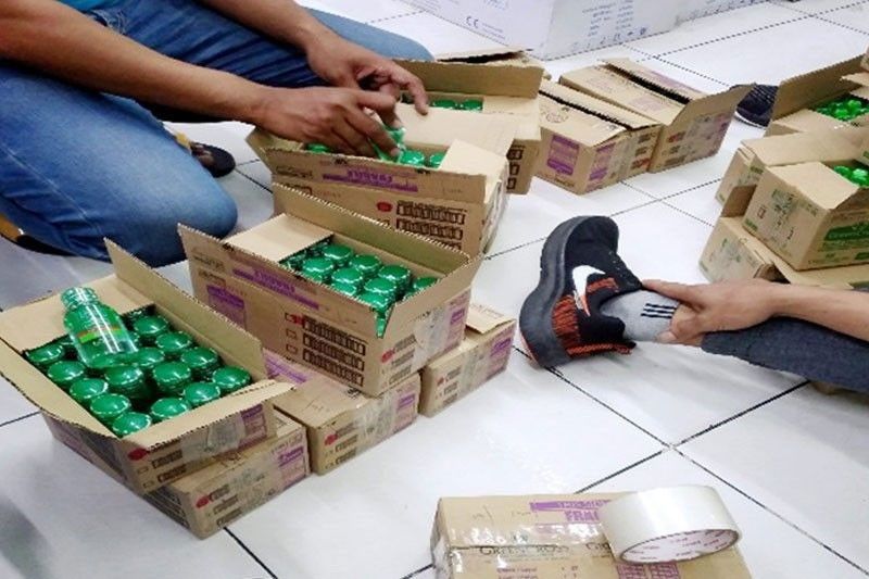 Cops nab Chinese trader selling overpriced alcohol