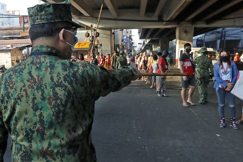 Kahit 'parang martial law,' DOJ pinakalma ang takot ng publiko habang lockdown