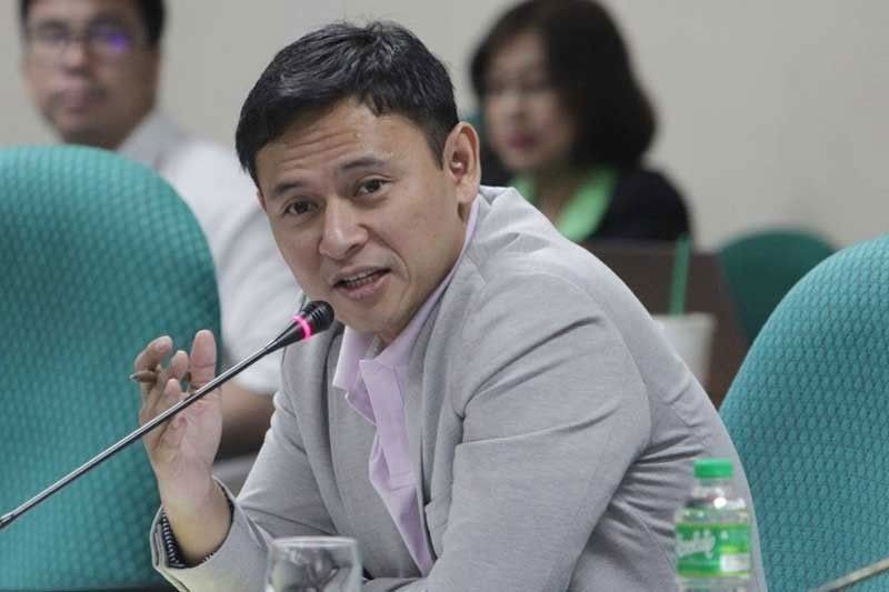 Angara eyes ban on handshakes