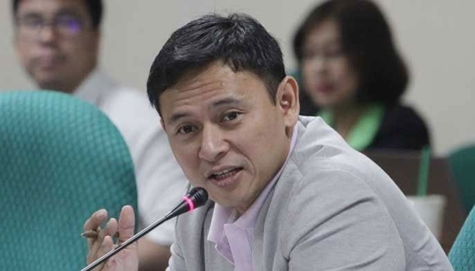Angara eyes ban on handshakes