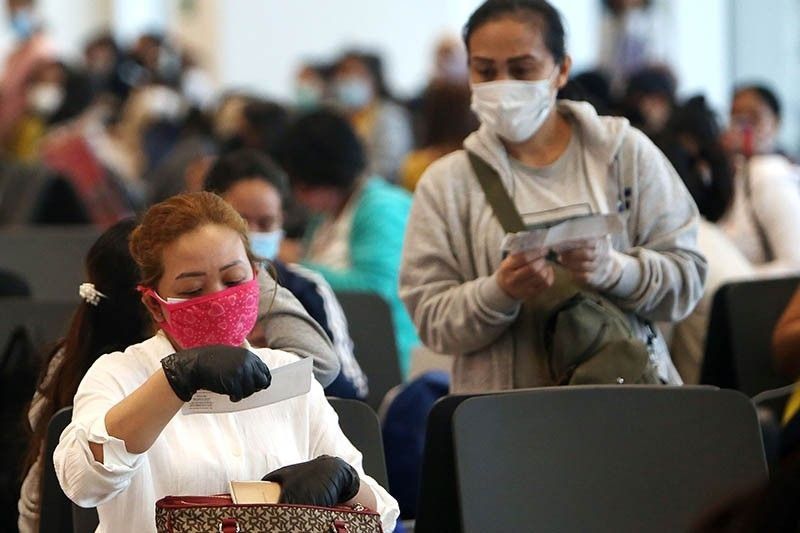 OFWs stuck in quarantine sites all home by Saturday â�� DOLE