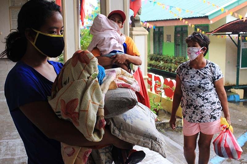 COVID-19 cases exceed 12,000 as â��Amboâ�� tears through virus-hit Philippines