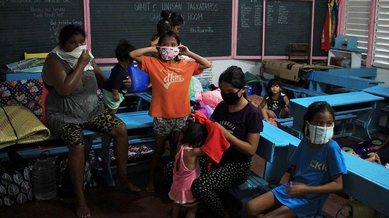 Typhoon Ambo forces 140,000 from homes in virus-hit Philippines ...