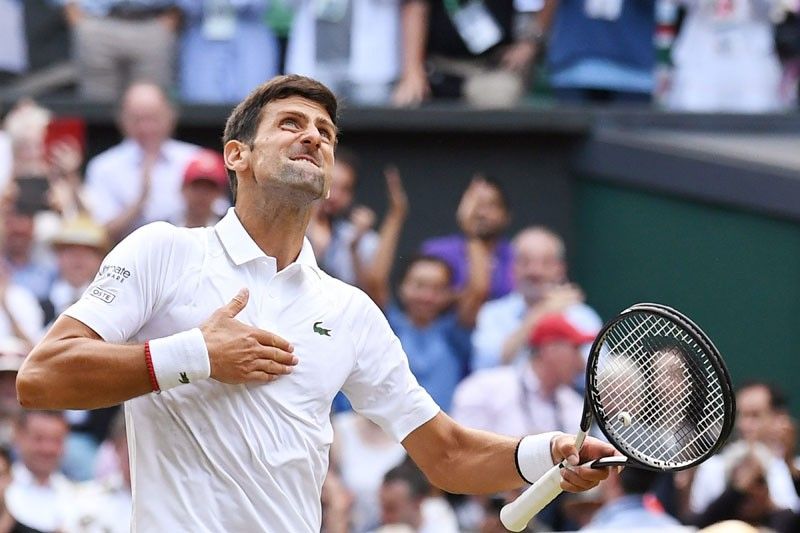Djokovic takes Federer's world number one record, eyes Grand Slam history