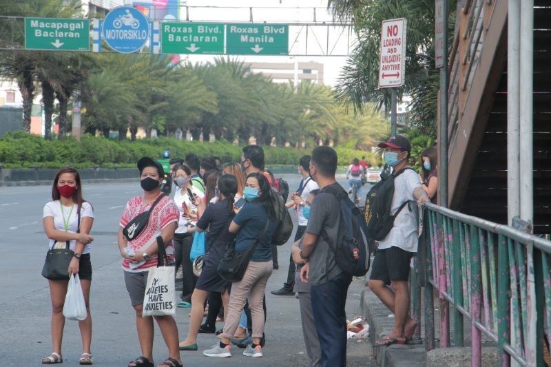 With public transpo absent, gov't finally allows motorcycle back-riding