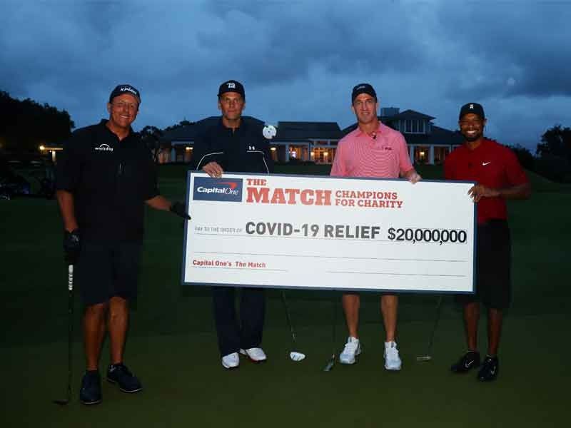 Woods-Manning prevail in star-studded match, raise $20M for charity