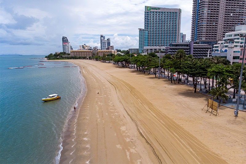 Thais seek sun and surf as officials re-open some beaches