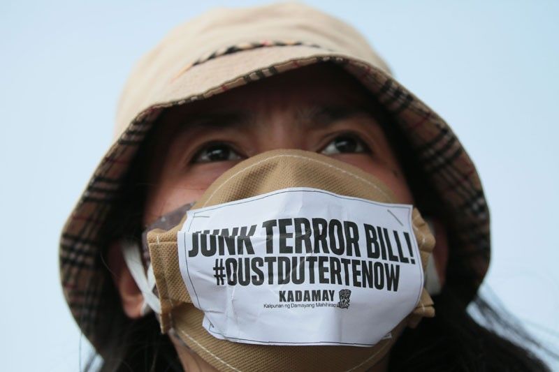 Anti-terror bill endorsed for signing amid rallies