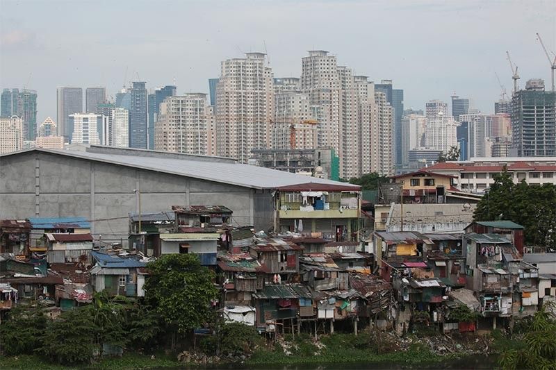 Beyond Manila Bay, measly housing budget leaves nothing for slum residents