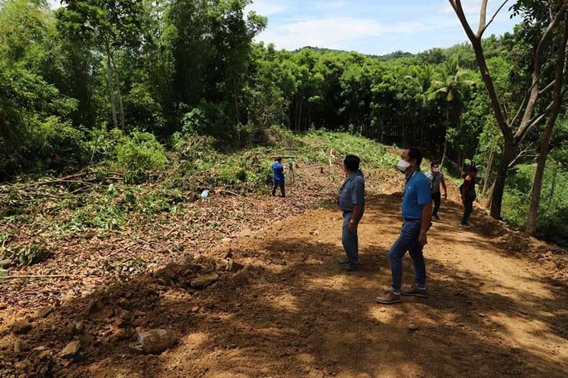 In Barangay Guba: Site development starts for new city cemetery