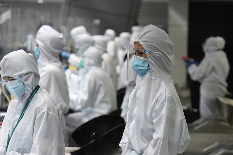 Countries tighten measures as global virus death toll nears 700,000