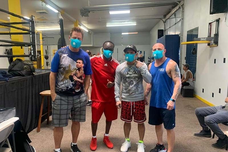 Boxers champion face masks under 'new normal'