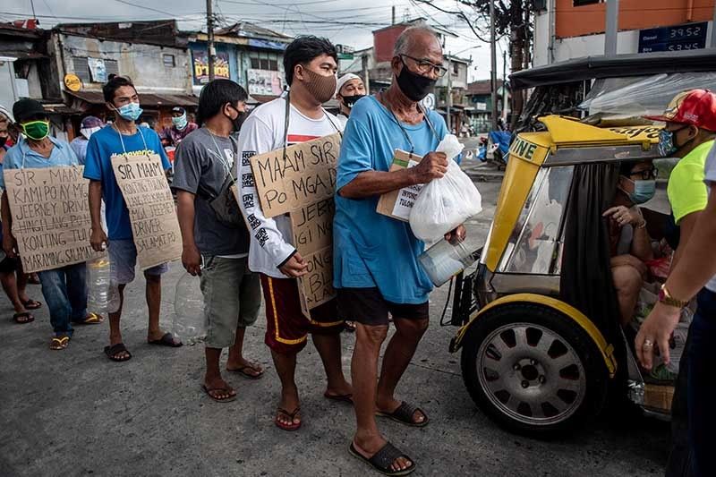 After entering recession, Philippines set for record collapse this year