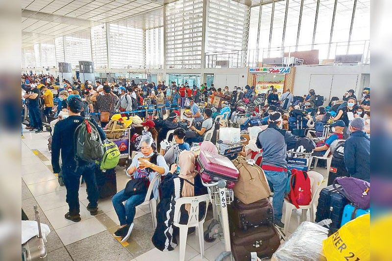 1,000 OFWs, LSIs crowd NAIA-2