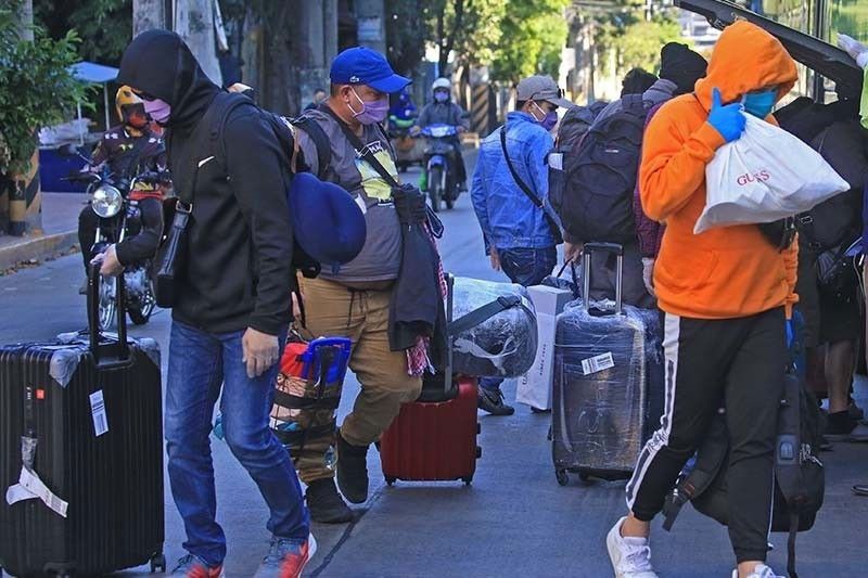 136,509 OFWs sent home â�� DOLE