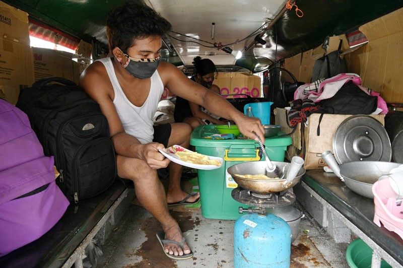Hungry and homeless: Jeepney drivers hit by virus