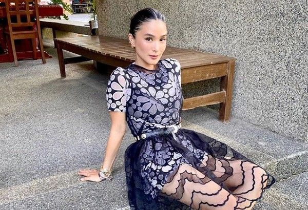 Heart Evangelista's white stockings in her #Baguio OOTD cost over P22,000  🤯 Find out more about her designer look in the link in our bio!