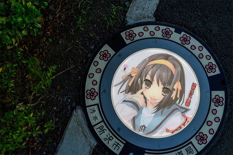 A hole new world: Japan city lights up sewer covers