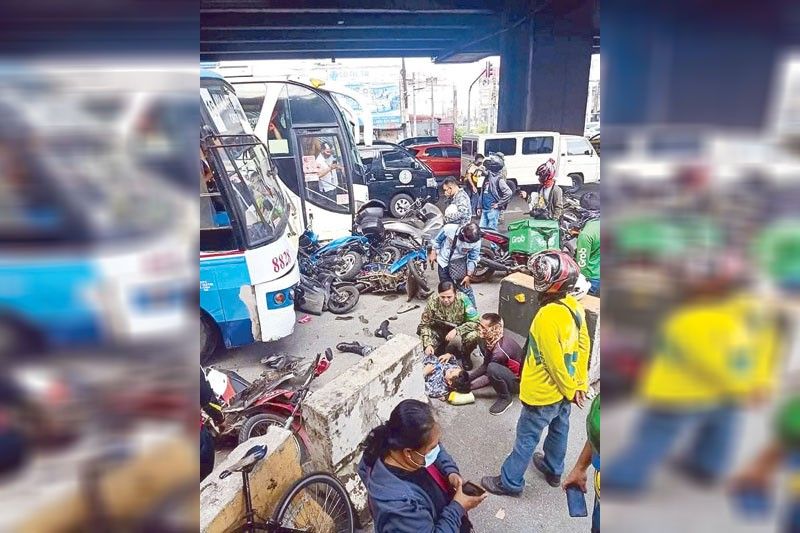 13 hurt as bus plows through 13 vehicles