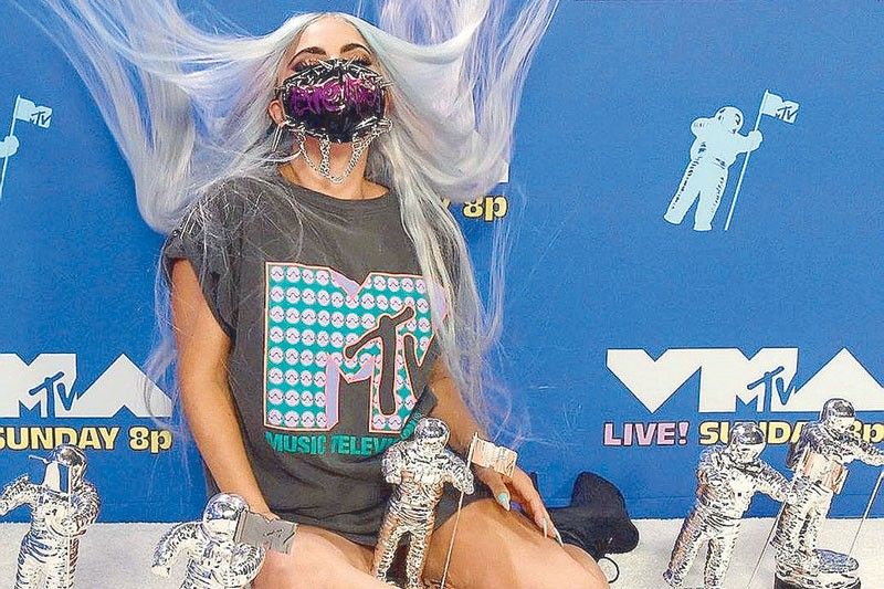 Lady Gaga is 1st Tricon winner at the VMAs