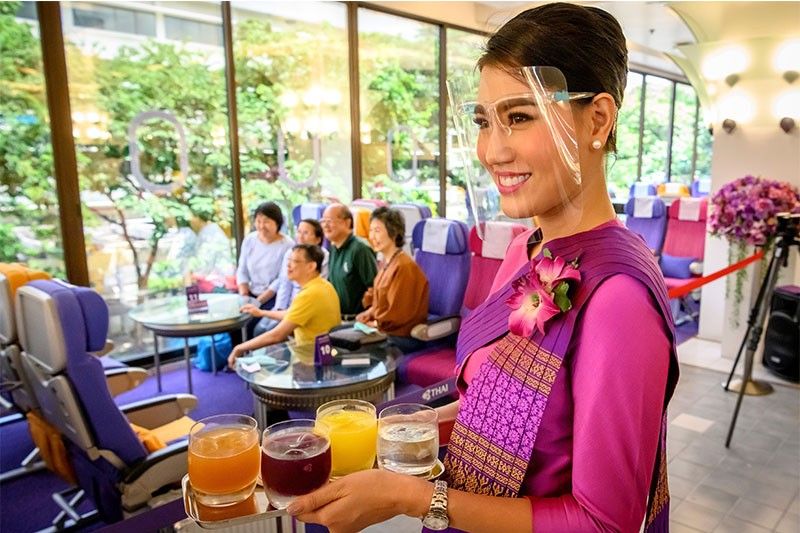 With travel limited, plane cafes take off in Thailand