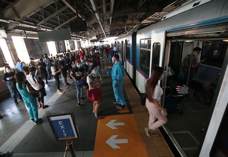 MRT-3 reminds passengers to observe health protocols as COVID-19 cases rise