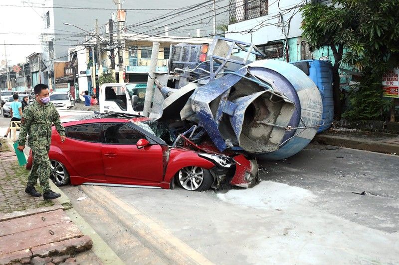 Woman, 2 kids hurt as cement mixer crushes car