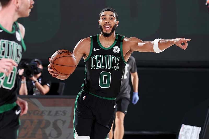 Celtics cool down Heat to stay alive