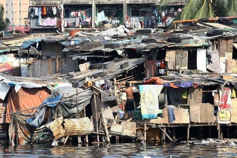 House panel OKs on-site relocation of informal settlers | Philstar.com