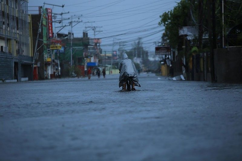 20 dead after Super Typhoon Rolly batters Philippines