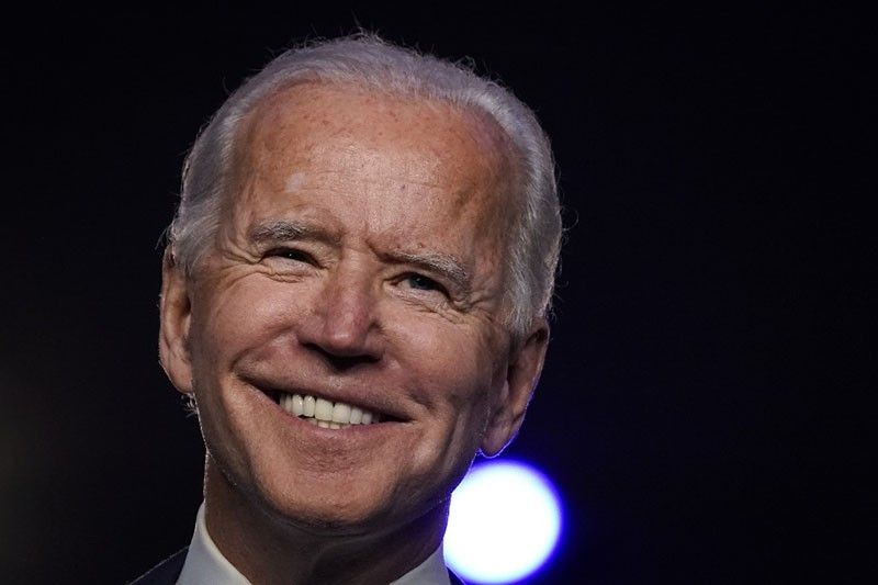 Confident in victory, Biden appeals for national unity