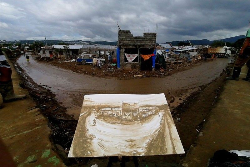 Mud paintings for a cause: Pinoy artists use typhoon-aftermath mud to help typhoon victims