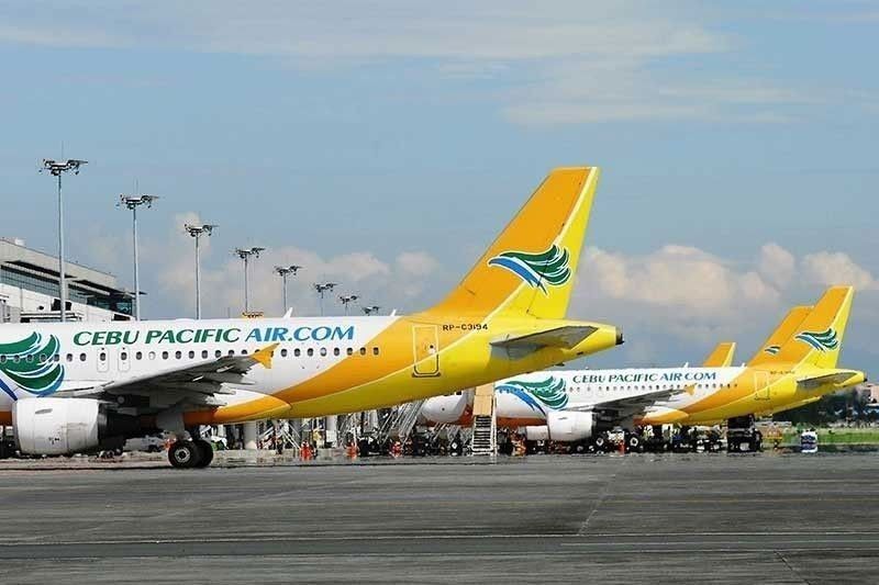 Cebu Pacific trims net loss as flights resume
