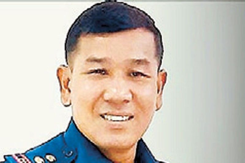Town cop chief axed over post on killings