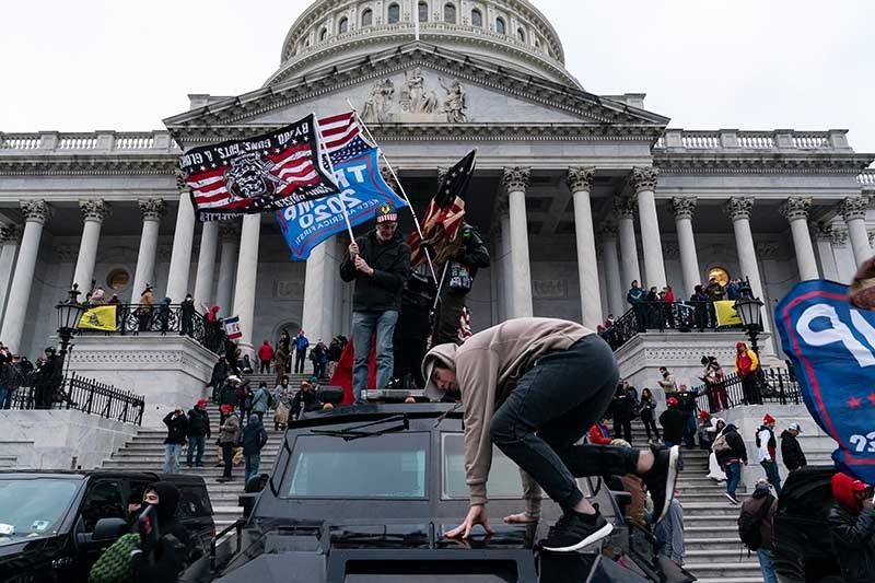 Mob storms US Capitol as Trump accused of 'coup'