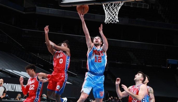 Harris shines as Nets snap 76ers' five-game winning streak