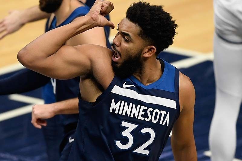 Timberwolves' Towns to miss 'several' weeks due to calf strain