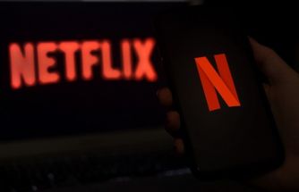In this file photo illustration a computer screen displays the Netflix logo on March 31, 2020 in Arlington, Virginia. Already the master of 2020's pandemic-era movie landscape, Netflix on January 12, 2021 offered a preview of upcoming 2021 releases, a list with no fewer than 70 star-studded feature films.