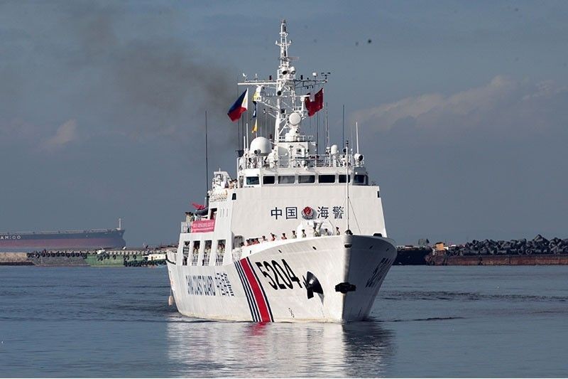 After Philippines' protest, China says new coast guard law not a threat of war