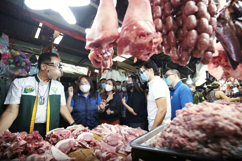 Quezon City waives rent for pork, chicken vendors