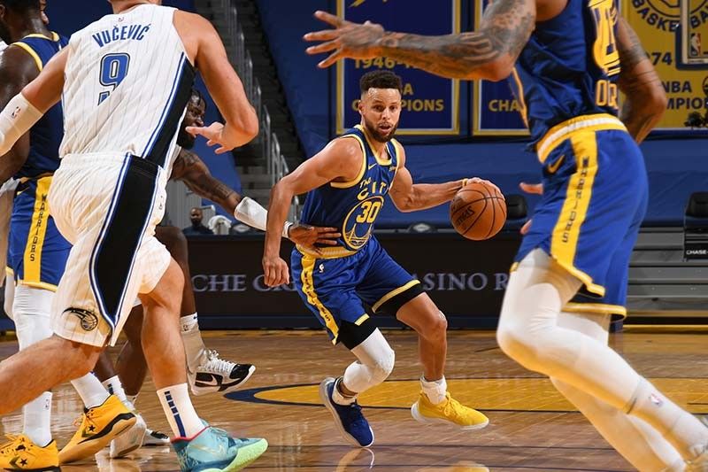 Curry, Golden State overpower Magic; Heat win 4th straight