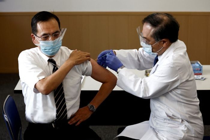 Japan starts vaccine rollout with healthcare workers