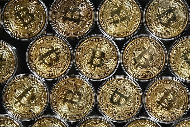 Bitcoin hits $1 trillion market cap, stocks are mixed