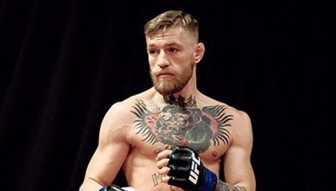 McGregor says broken toe forced him out of comeback fight