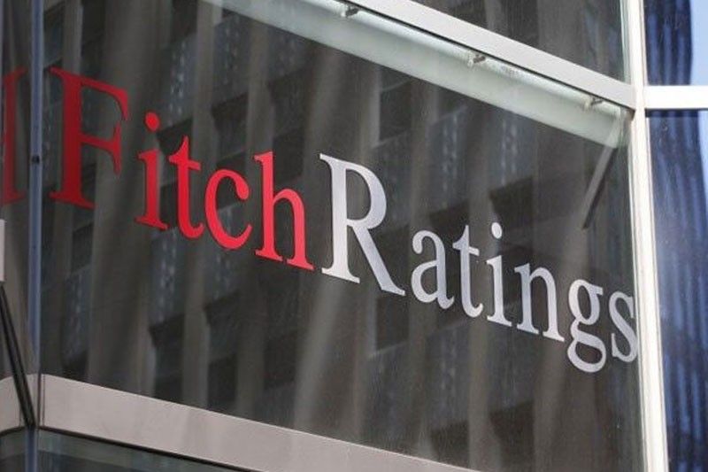 Fitch warns banks of risks from falling property prices