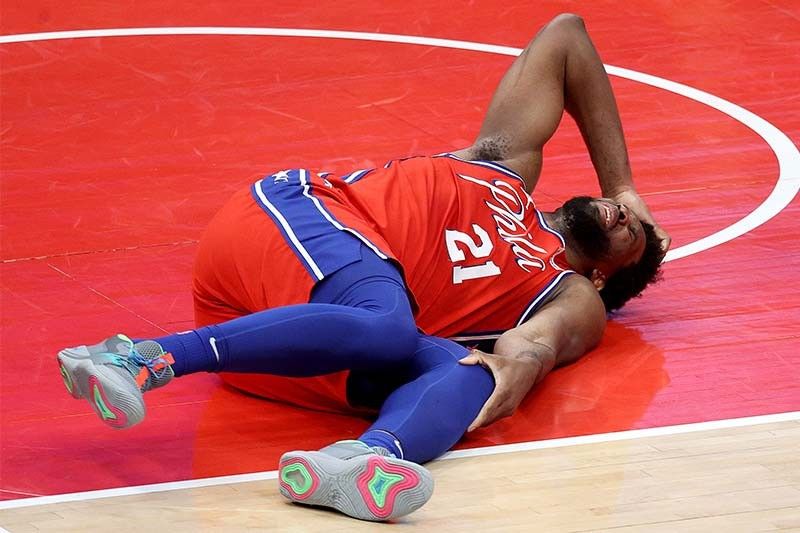 Sixers top Wizards as Embiid is injured; Nuggets beat Grizzlies