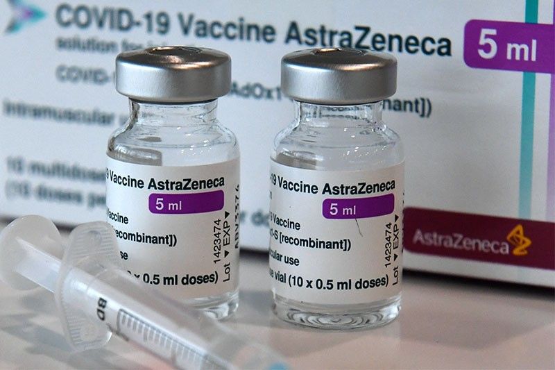 Covid vaccine maker AstraZeneca says 2021 profit falls