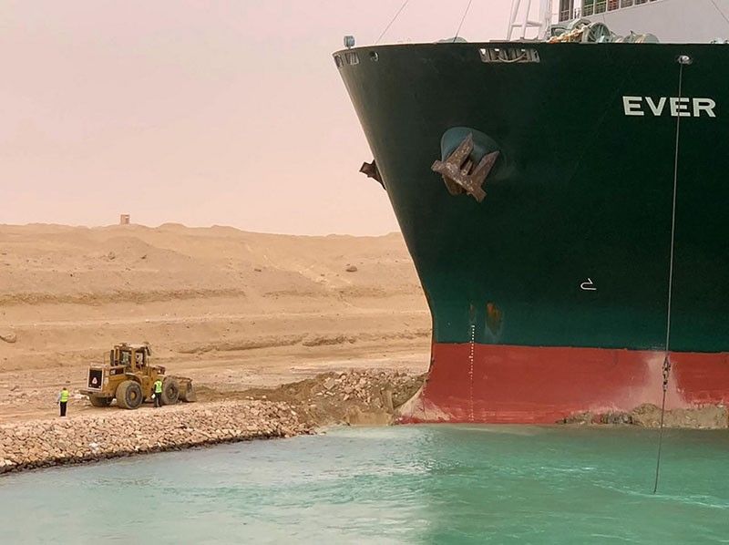 Giant ship blocks Suez Canal after running aground in sandstorm