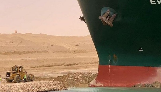 Giant ship blocks Suez Canal after running aground in sandstorm