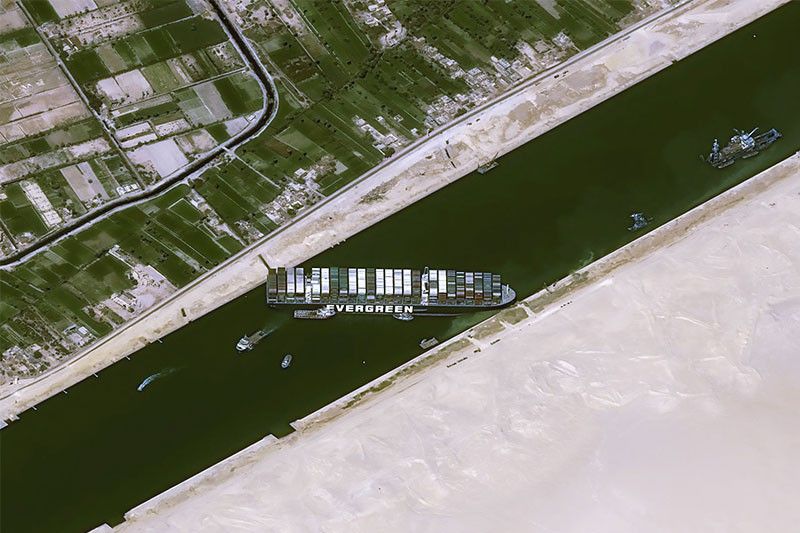 Egypt shuts Suez Canal amid struggle to refloat grounded megaship